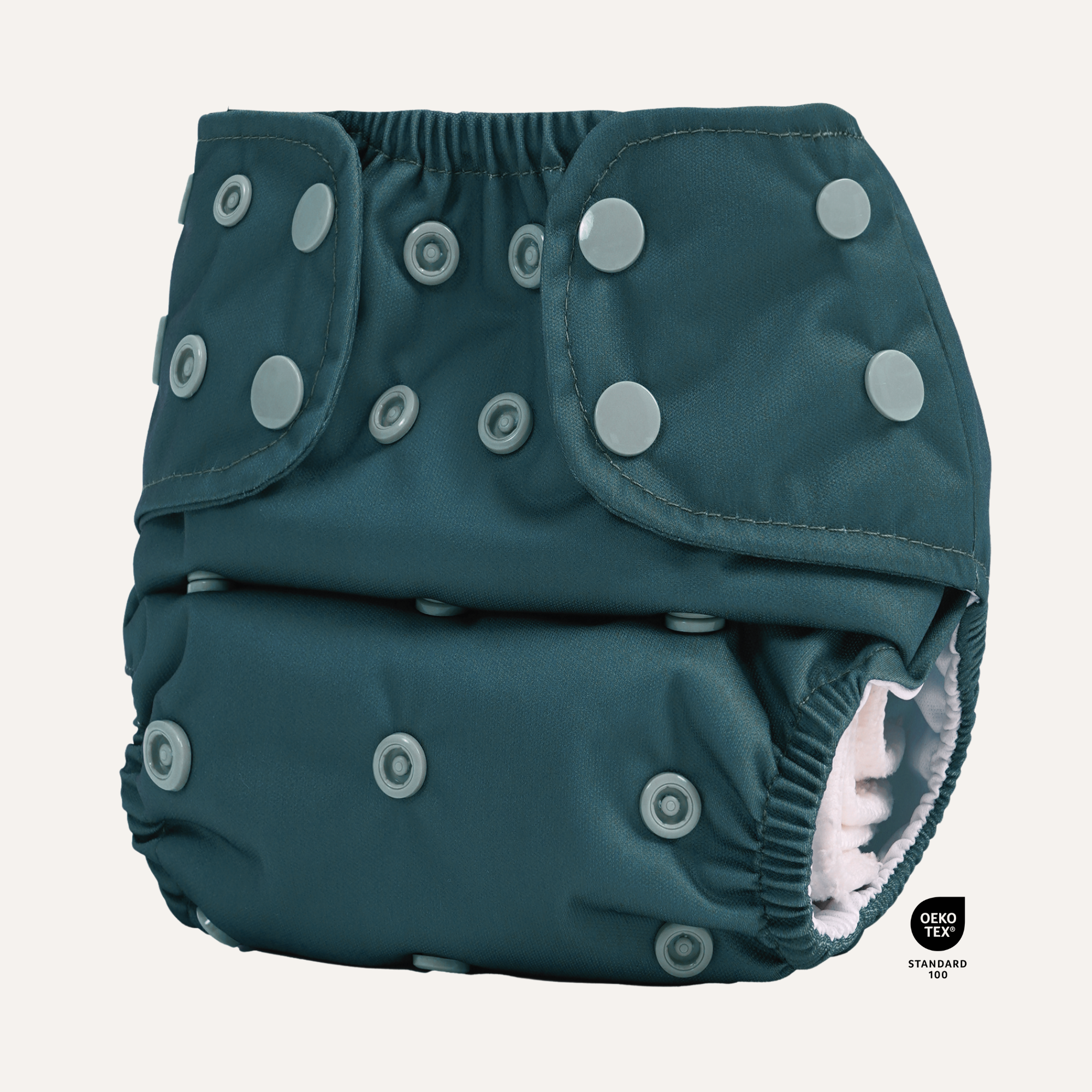 All-in-two cloth diaper with solid dark teal print and snap-in bamboo inserts