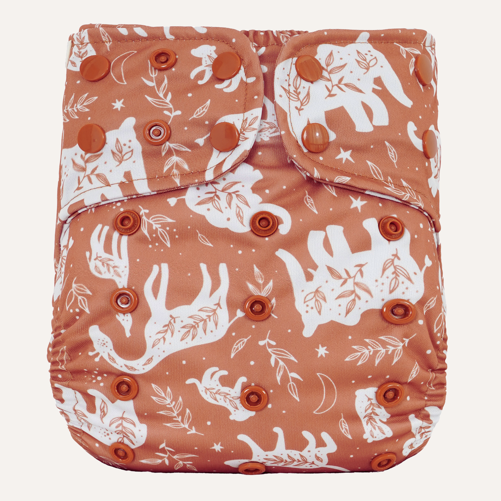 Patterned diaper cover with white animal designs on a light background