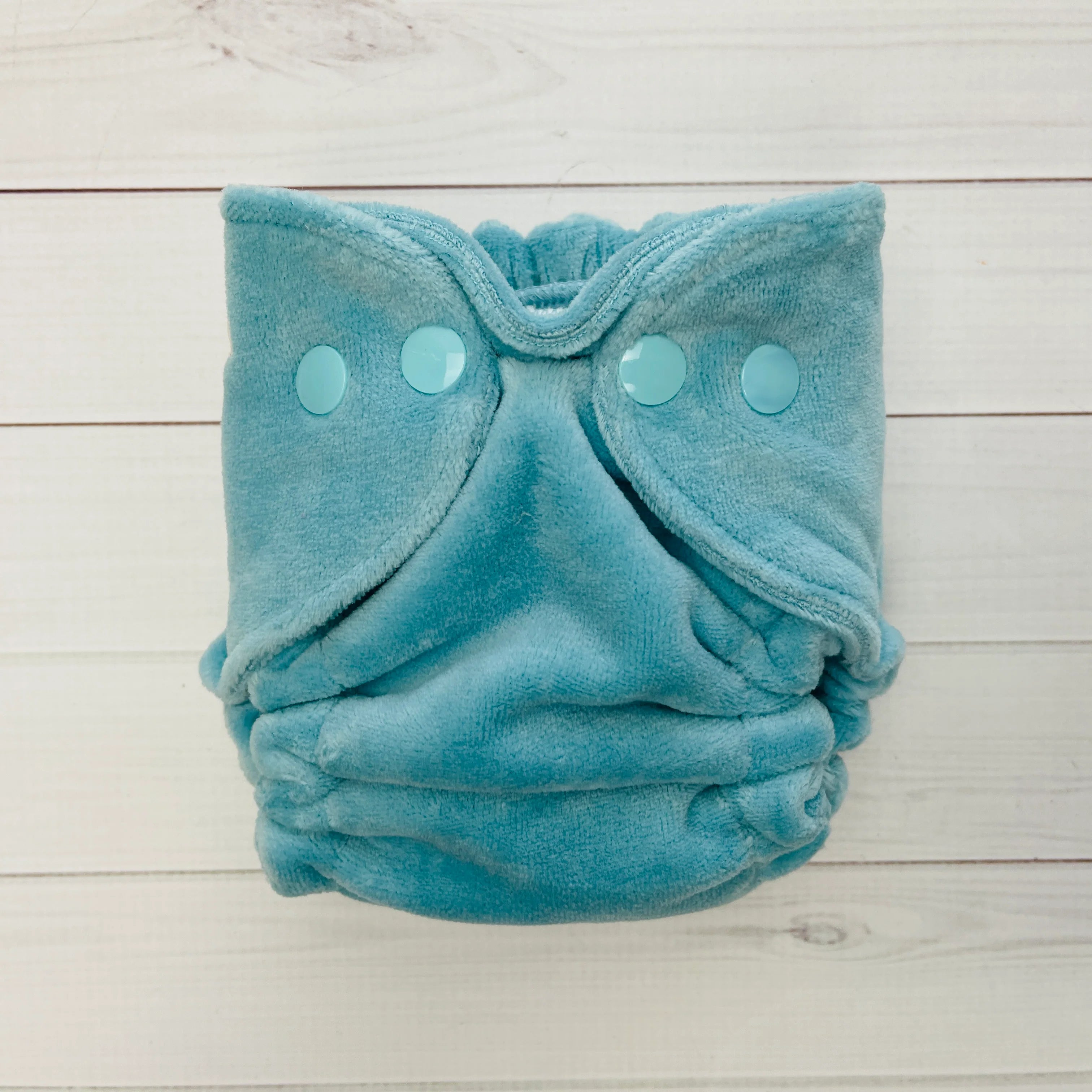 newborn fitted velour diaper in blue