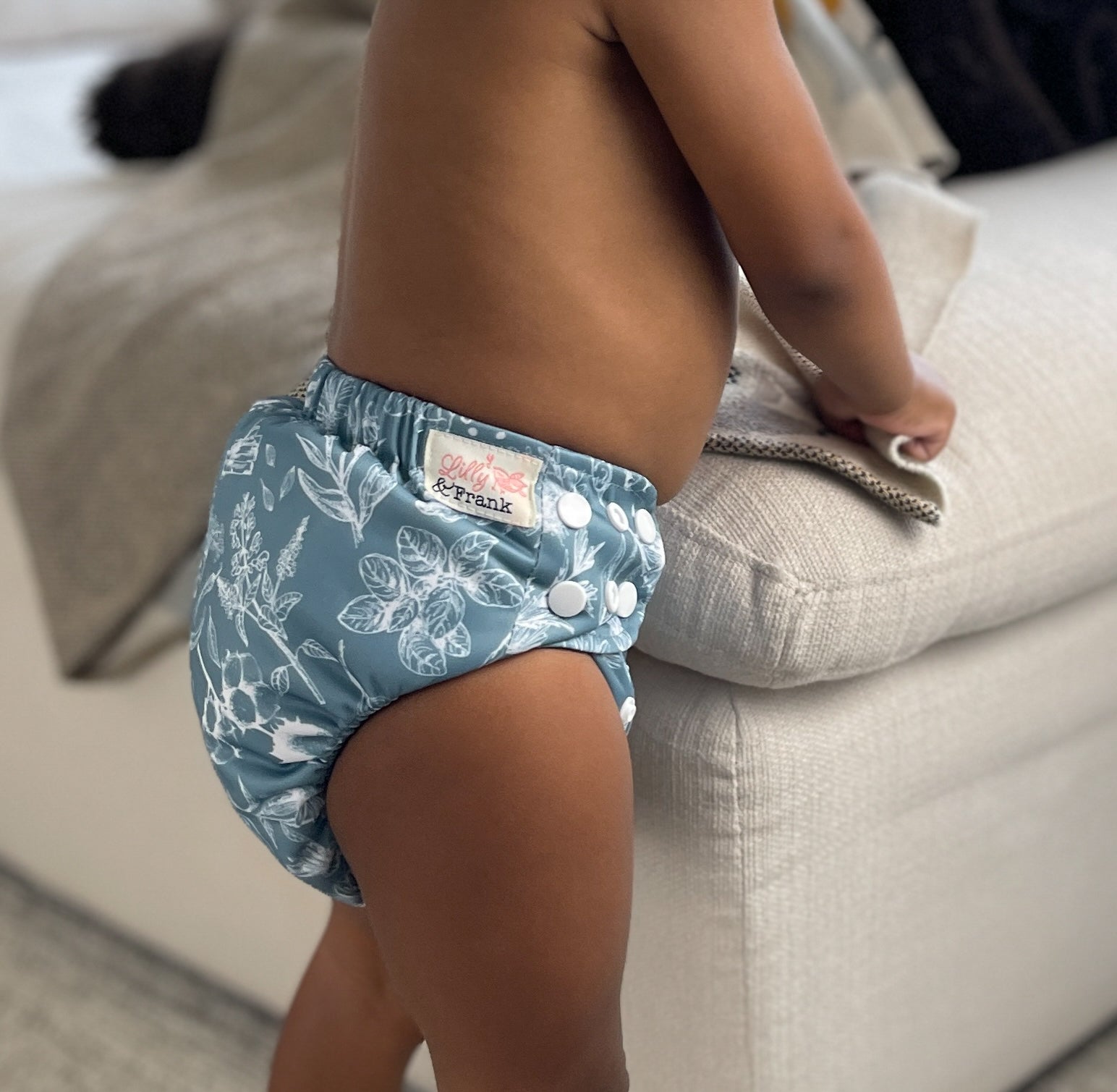 toddler wearing lilly and frank all-in-two cloth diaper