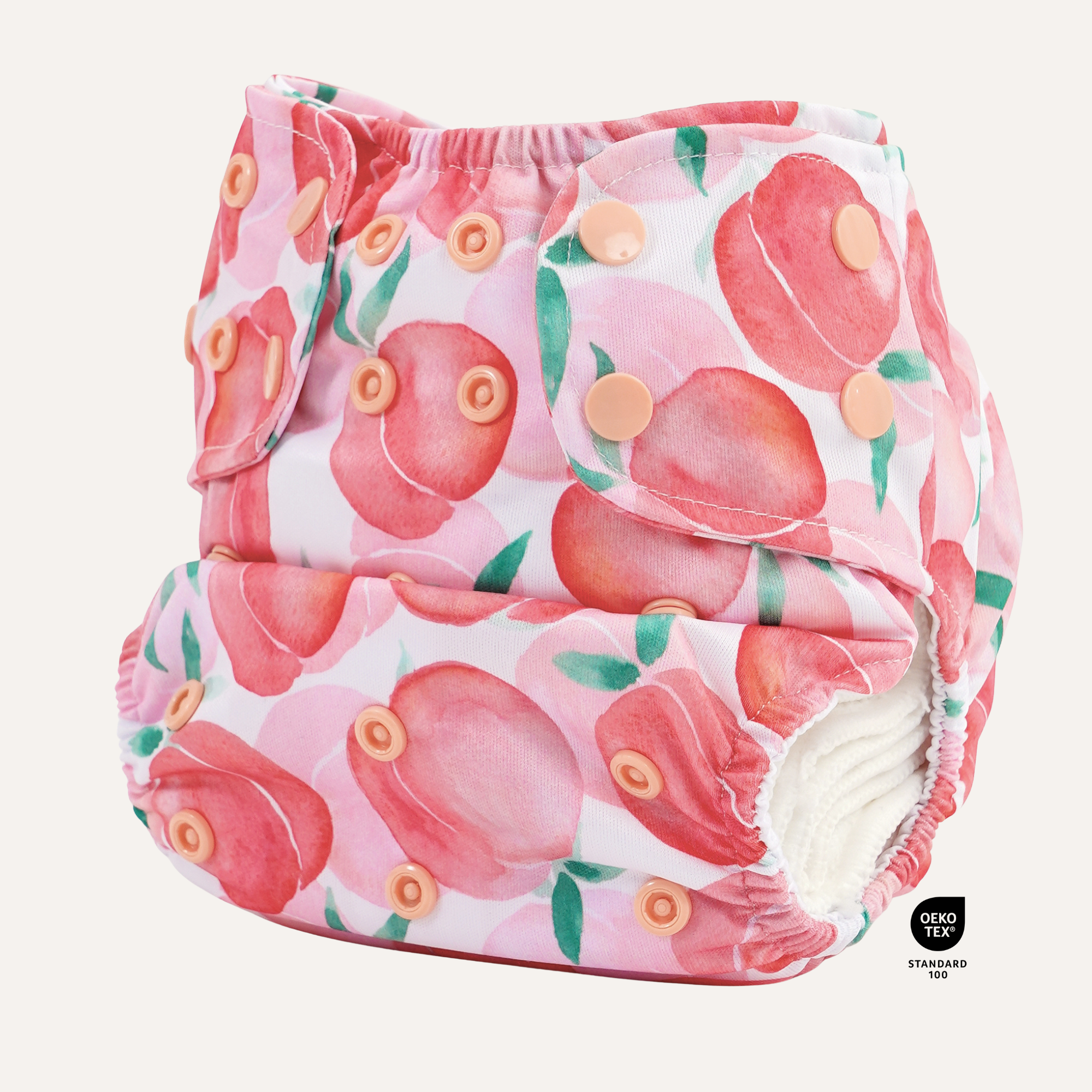 All-in-two cloth diaper with snap-in bamboo insert and peach print