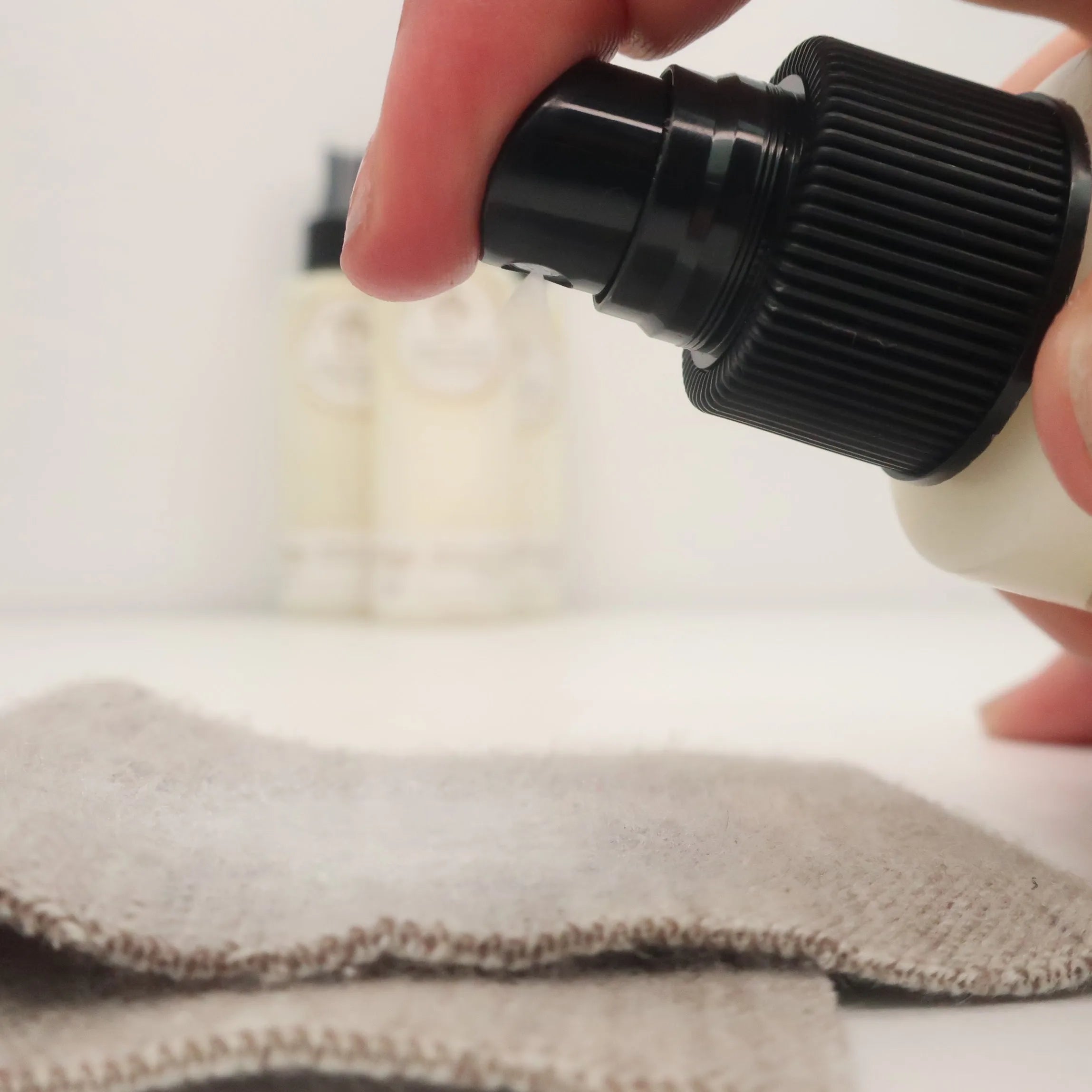 lanolin spray being sprayed onto a wool