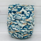 Reusable nappy with whale pattern on a white background