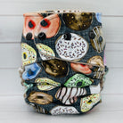Reusable nappy with colorful donut pattern on a white background