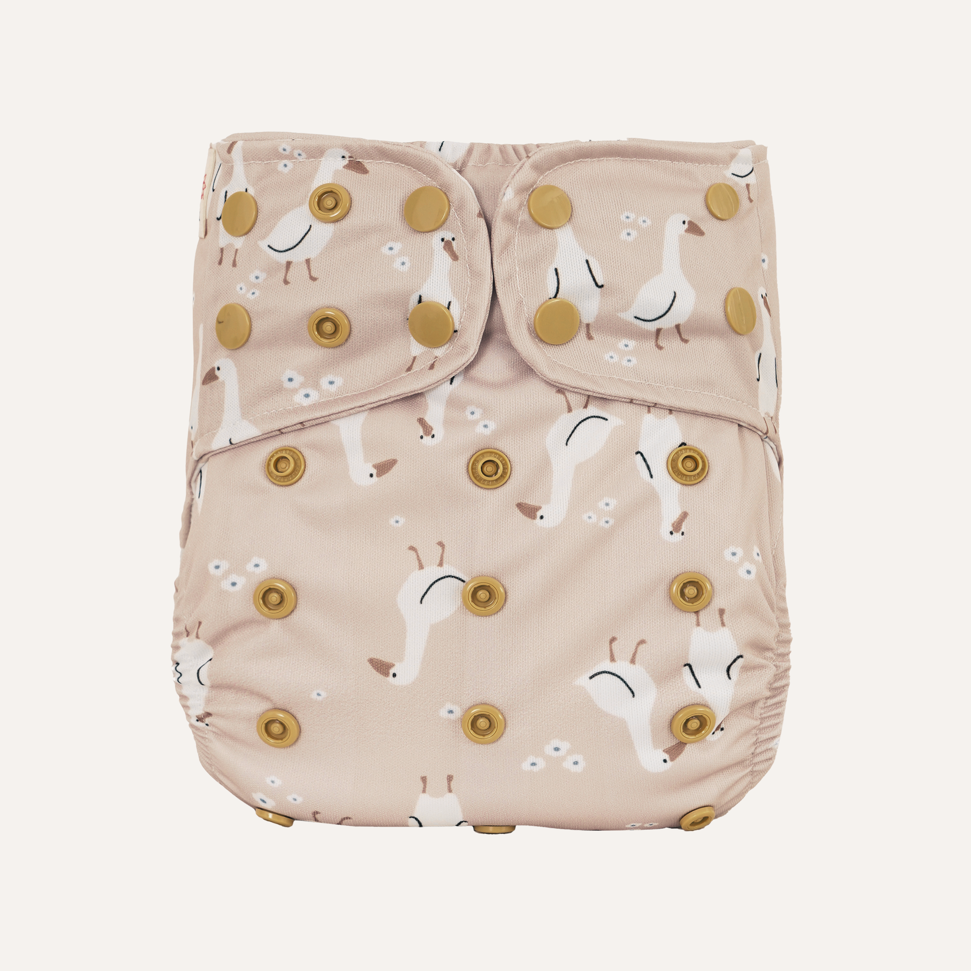 Beige cloth diaper with goose pattern on a white background