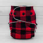 Red and black plaid diaper with buttons on a white background