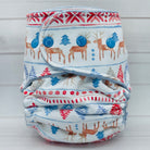 Folded cloth diaper with deer and snowflake pattern on a white background