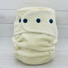 White cloth diaper with blue snaps on a white background